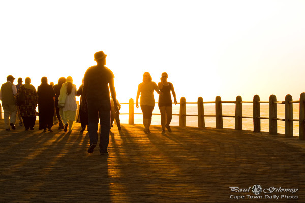 A busy promenade sunset